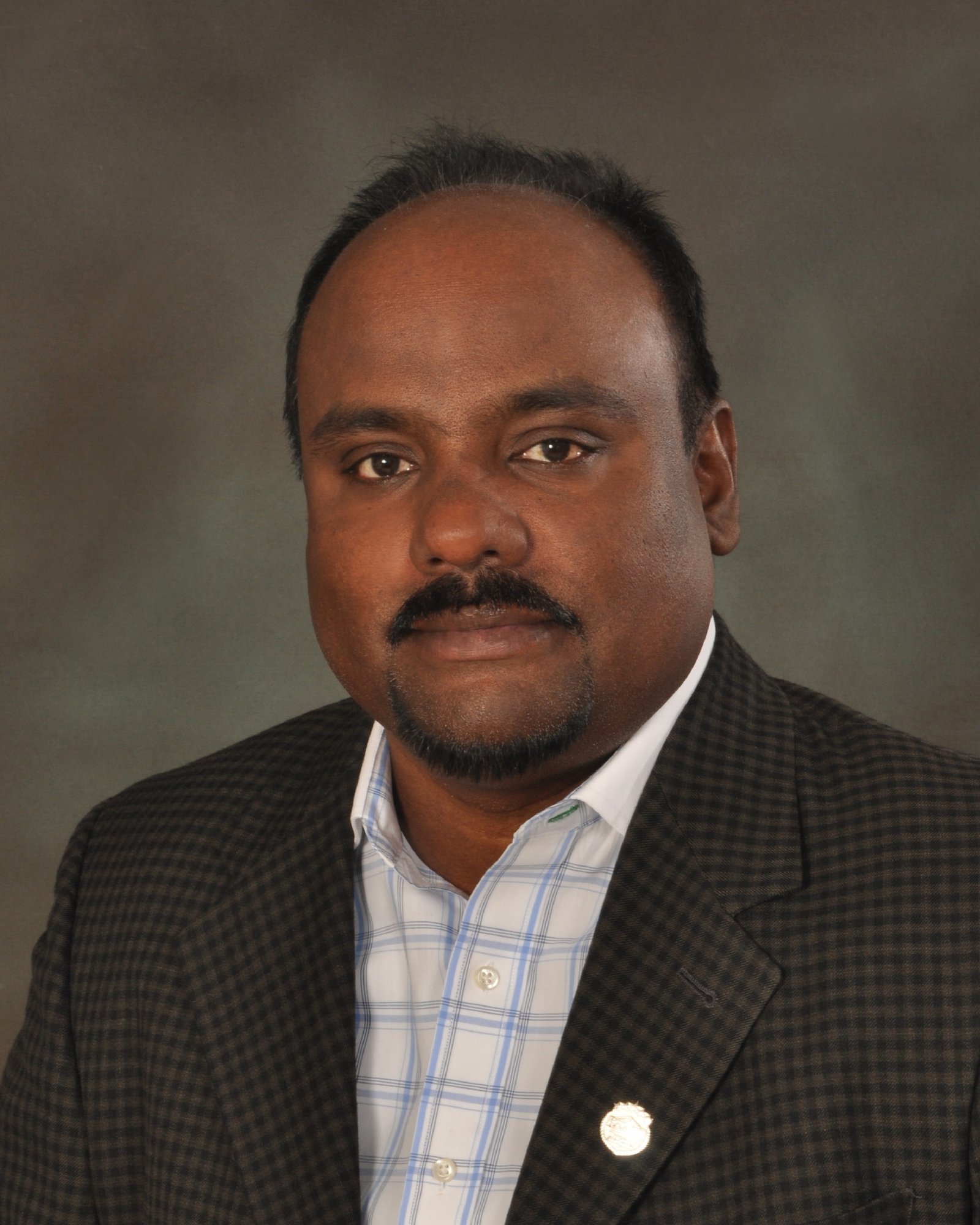 Siva Kandiah — Real Estate Agent